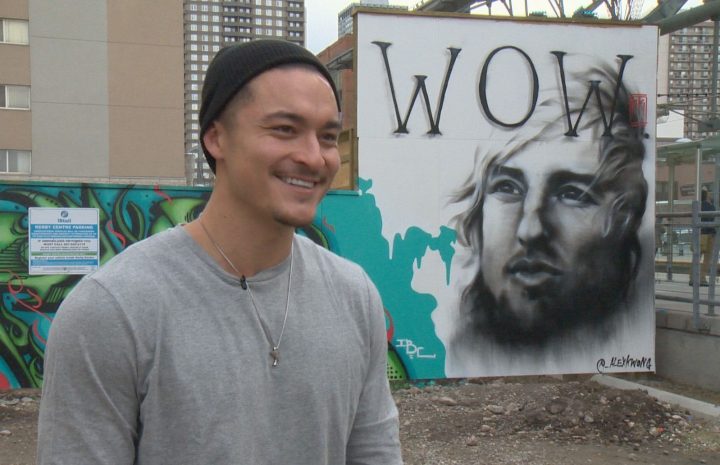 Calgary artist Alex Kwong brightened the mood and the CTrain platform with a painting of Owen Wilson.