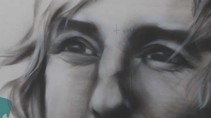 Calgary artist Alex Kwong brightened the mood and the CTrain platform with a painting of Owen Wilson.