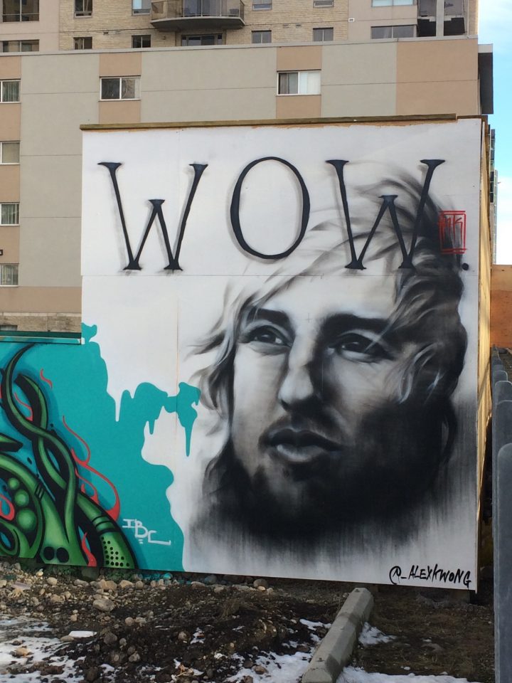 Calgary artist Alex Kwong brightened the mood and the CTrain platform with a painting of Owen Wilson.