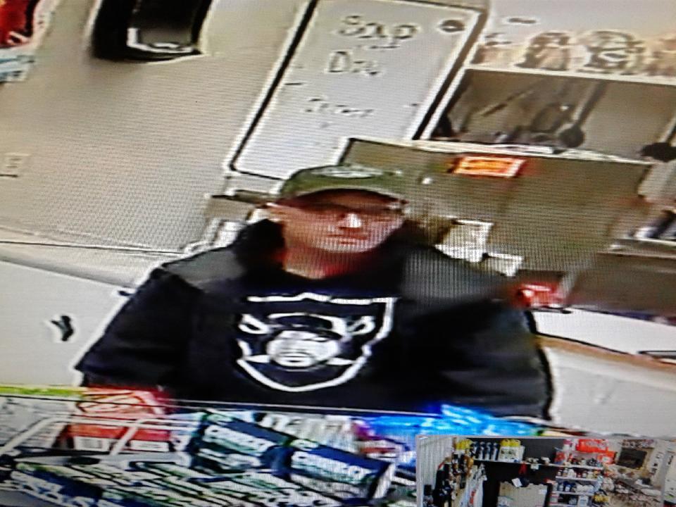 Surveillance photo of a man Pincher Creek RCMP are looking to identify.