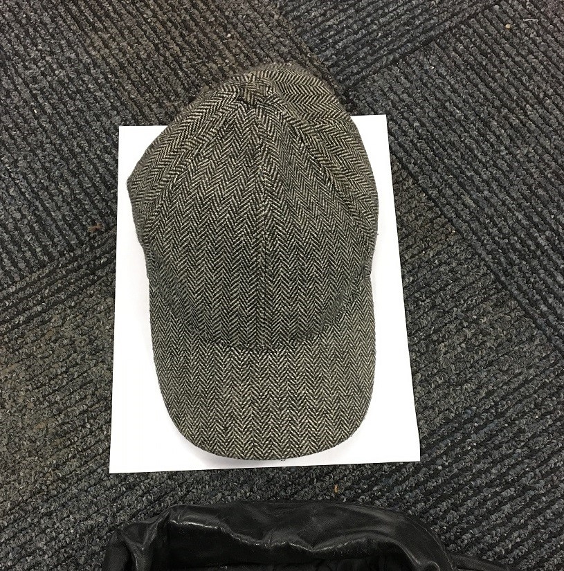 A grey hat worn by the victim of a fatal hit and run.