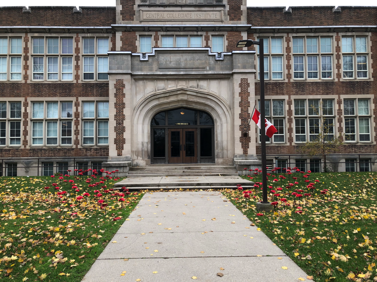 165 ceramic poppies dot the front lawn of Central Secondary School. Each one represents a former student killed during the first or second World War. 