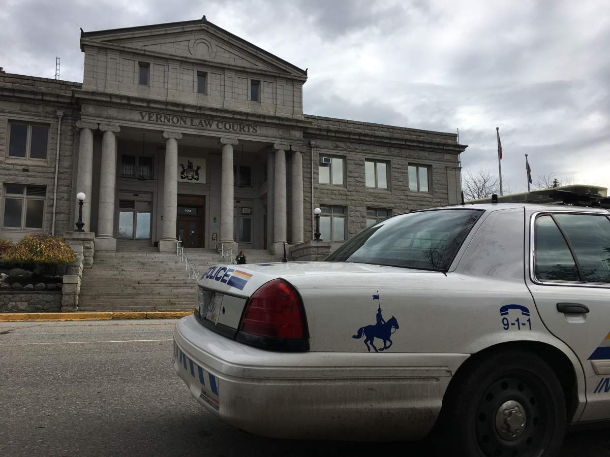 A RCMP cruiser parked in front of the Vernon Courthouse.