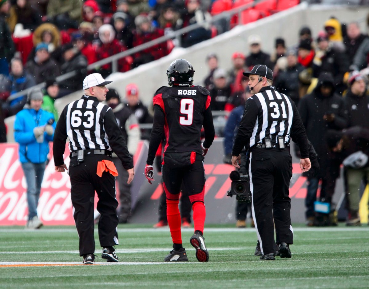 Ottawa Redblacks' Jonathan Rose (9) is escorted off the field while taking on the Hamilton Tiger-Cats during first half CFL East Division final action on Sunday, Nov. 18, 2018. Ottawa Redblacks defensive back Jonathan Rose has been suspended for the Grey Cup game, but there still is a chance he could play in the CFL final.