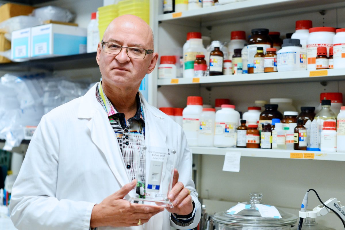 Dr. Michael Rieder, professor at Western University and Scientist at Robarts Research Institute with his new rapid test kit for E. Coli.