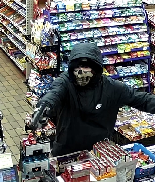 City police say they're looking for a suspect (pictured above) who's wanted in connection with a convenience store hold-up.