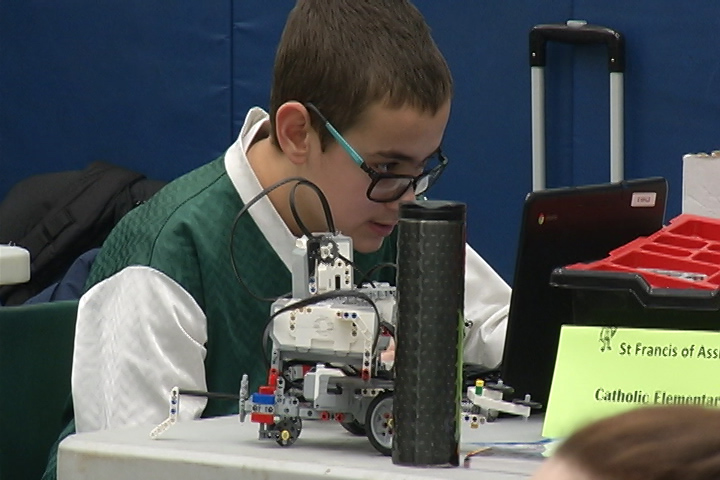 A student works on his robot during a robotics competition at St. Patrick Elementary School in Ontario.