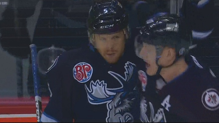 Cam Schilling celebrates a goal for the Manitoba Moose.