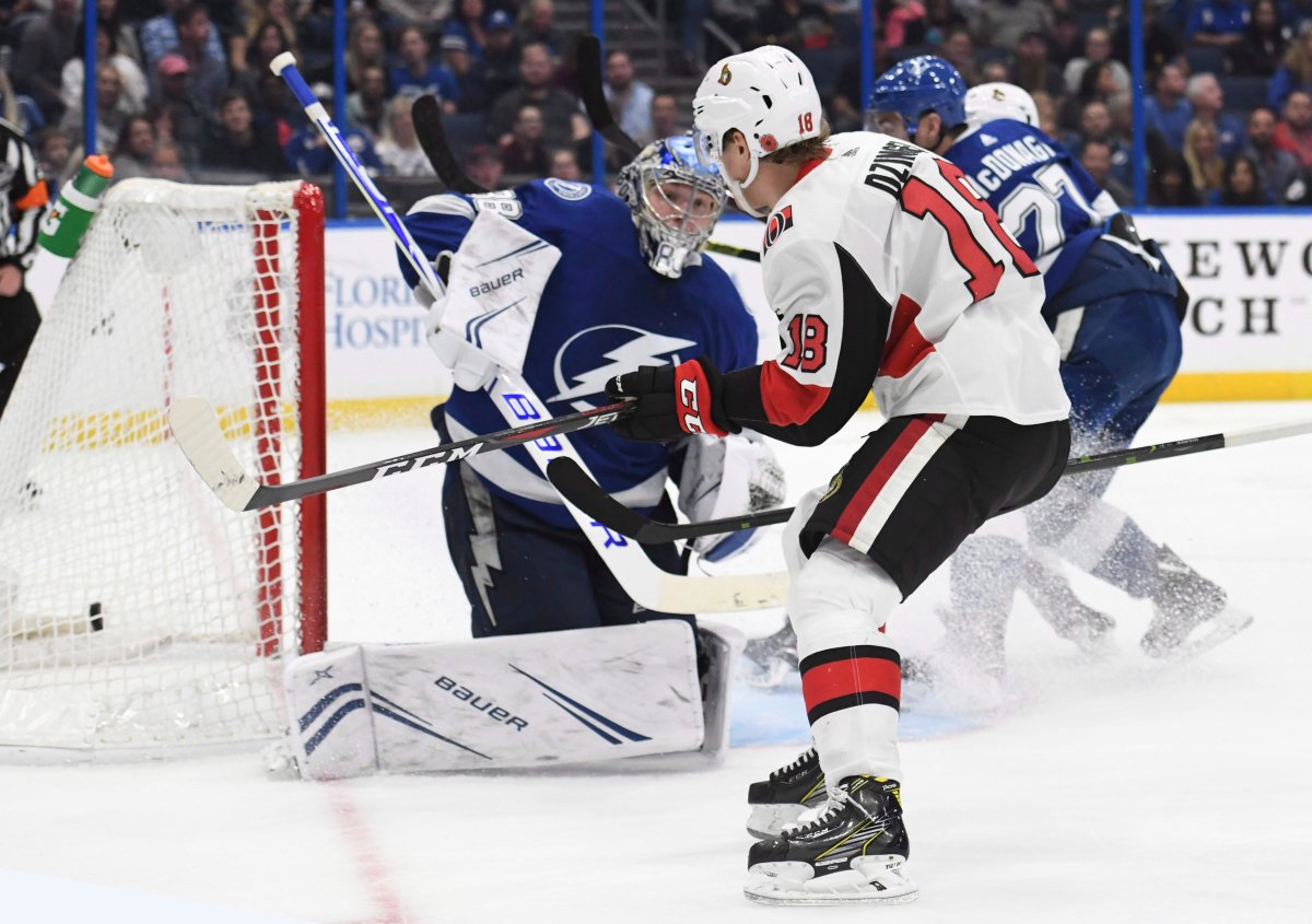 Ottawa Senators left wing Ryan Dzingel (18) scores past Tampa Bay Lightning goaltender Andrei Vasilevskiy (88) during the third period of an NHL hockey game in Tampa, Fla., Saturday, Nov. 10, 2018.