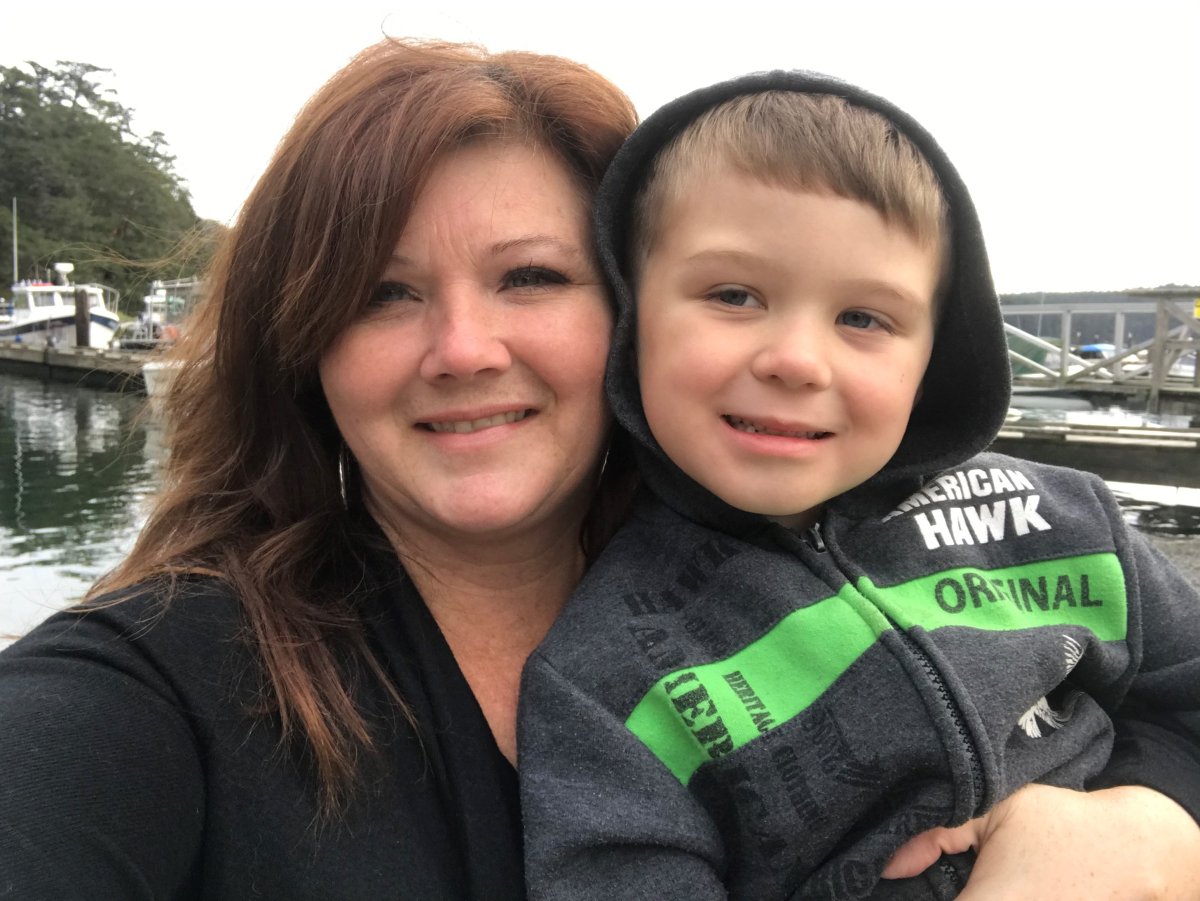 Shannon Burnside and her six-year-old son Jax at the Cheanuh Marina.