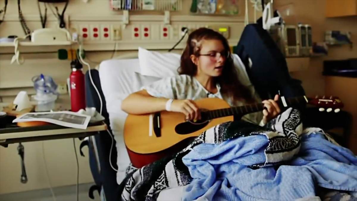 Kira Iaconetti, 19, performs after an operation to remove a tumour in an effort to help her return to singing.