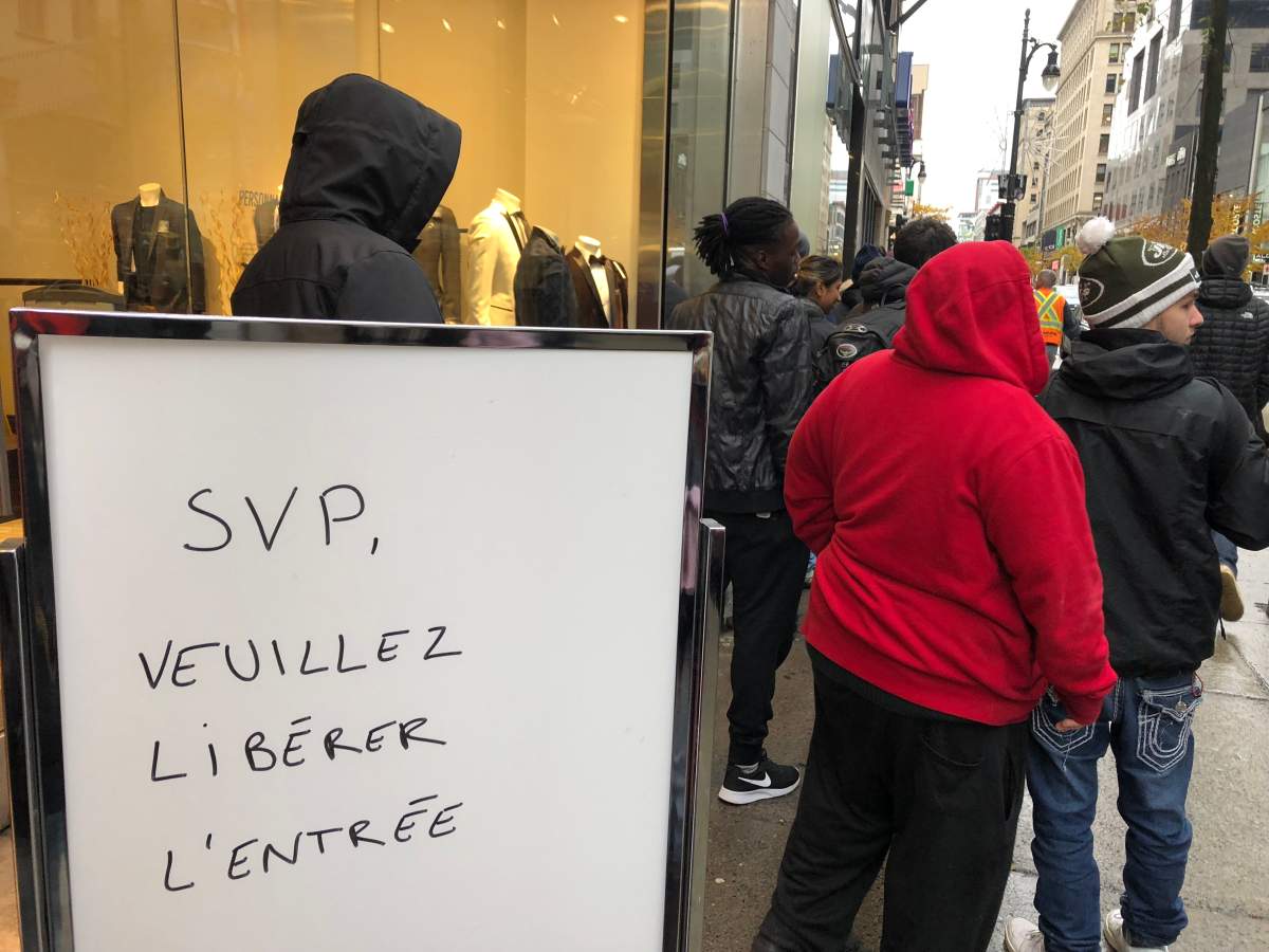 Stores near the SQDC in downtown Montreal have their entrances blocked by long lineups to access the government;s marijuana-run stores. Friday November 2, 2018.