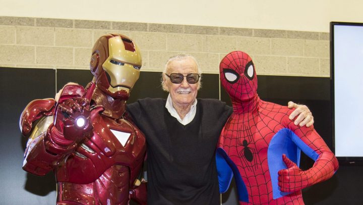 Marvel Comics legend Stan Lee strikes a pose with Iron Man and Spider-Man at HASCON on Sept. 8, 2017.