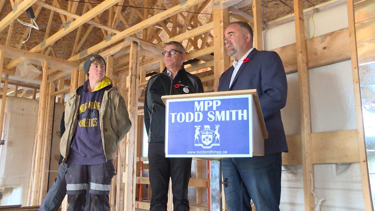 Minister of Economic Development, Job Creation and Trade Todd Smith speaks at a news conference.