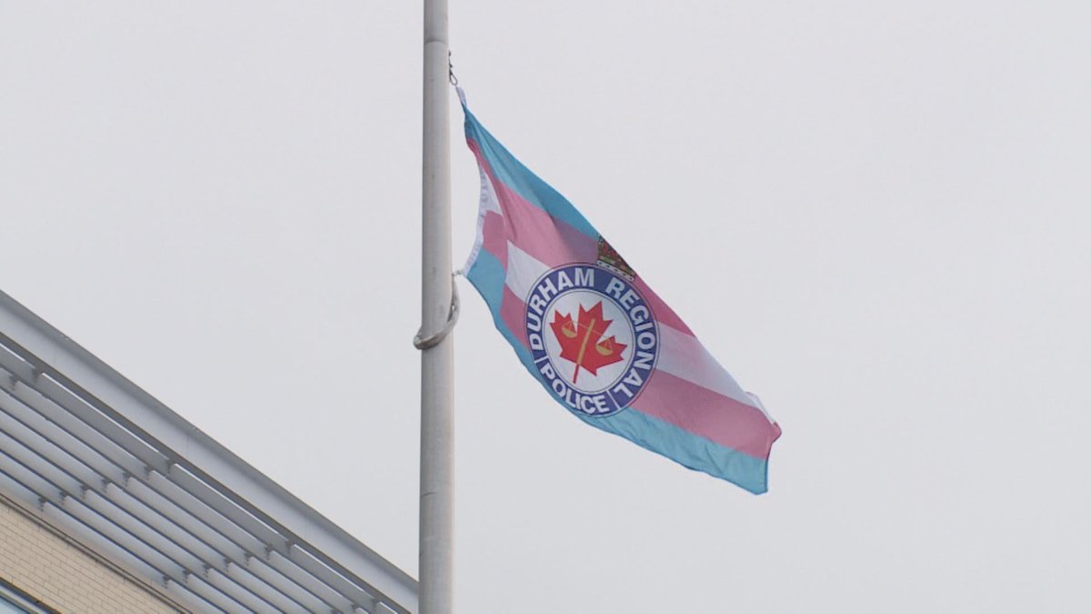 FILE. Police marked the annual Transgender Day of Remembrance with a flag-raising ceremony at regional headquarters in Whitby, Ont .
