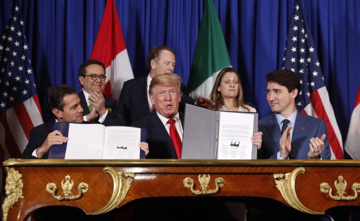 U.S. President Donald Trump, Prime Minister Justin Trudeau and Mexico’s President Enrique Pena Neto participate in the USMCA signing ceremony, Friday, Nov. 30, 2018 in Buenos Aires, Argentina.