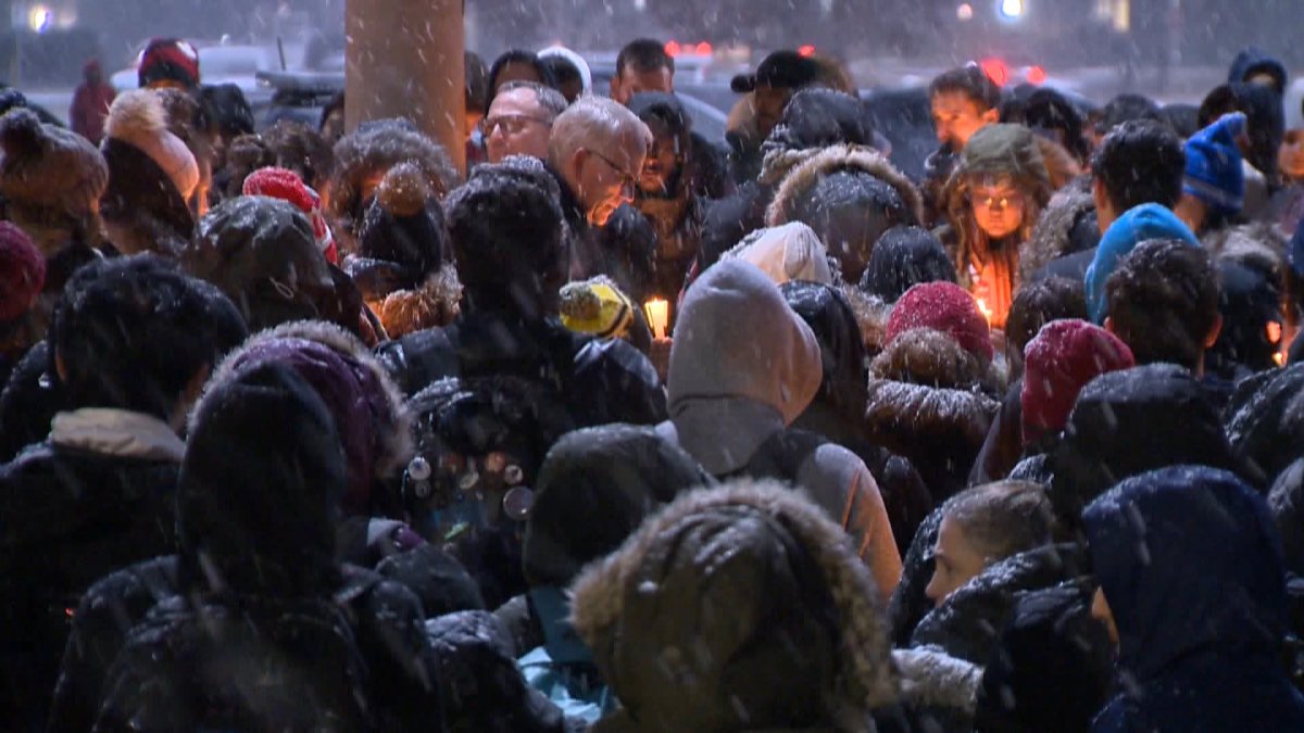A large group gathered outside UOIT in north Oshawa on Thursday for a candlelight vigil to honour Rhyss Glenfield.