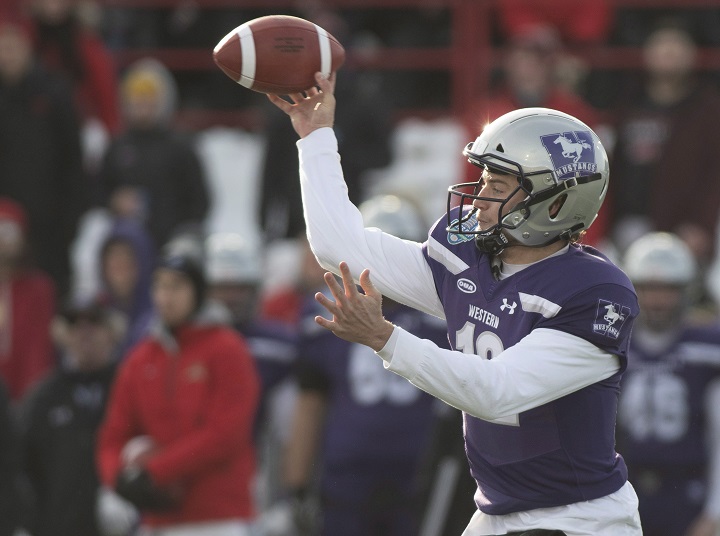 Western University Mustangs quarterback Chris Merchant throws a pass during first-quarter action of the Vanier Cup final against Laval University Rouge et Or on Saturday, Nov. 24, 2018 in Quebec City.