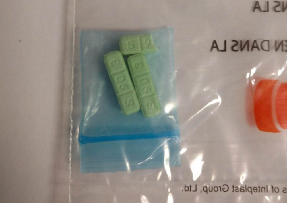 Police are warning the public not to take pills that look like these as they may be counterfeit.