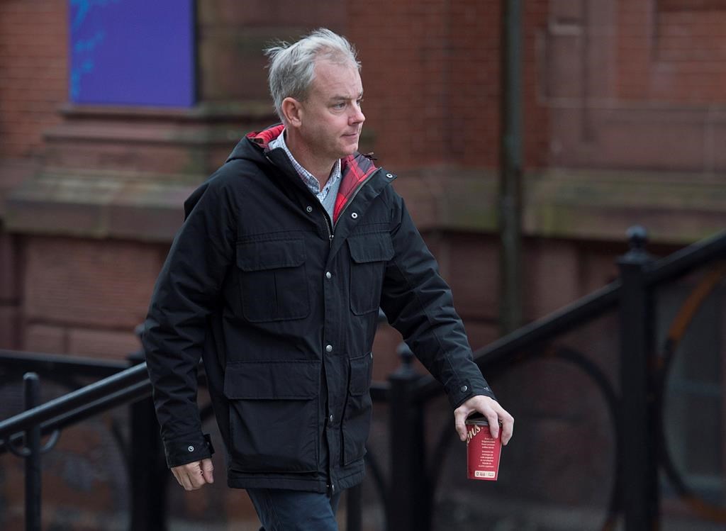 Dennis Oland arrives at the Law Courts in Saint John, N.B., on Tuesday, Nov. 6, 2018.