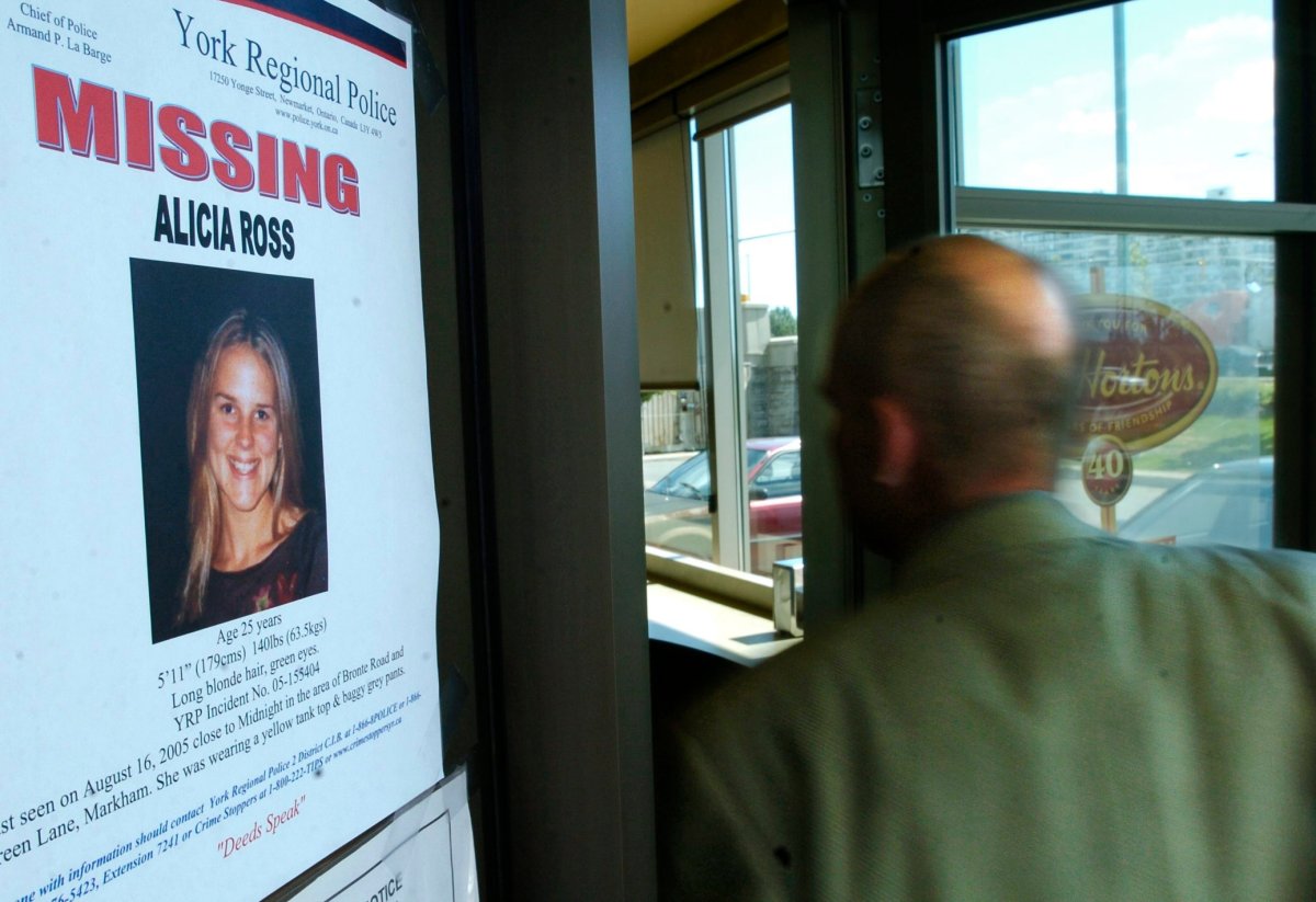 A man walks into a Tim Horton's location off Bayview Avenue in Thornhill in 2005 past a missing poster of 25-year-old Alicia Ross. 
