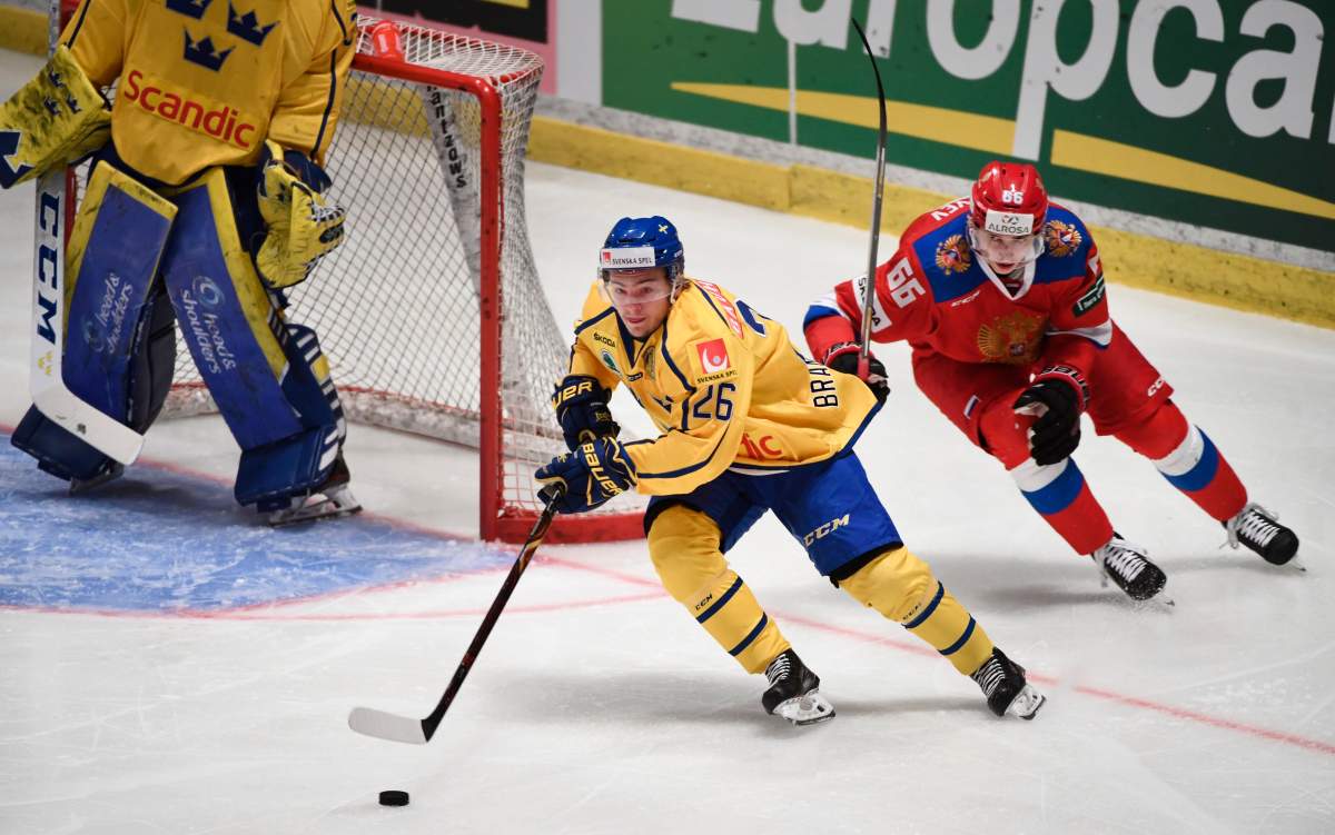 Sweden’s Erik Brannstrom (L) is chased by Russia’s Ilya Mikheyev during the Sweden Hockey Games tournament match between Sweden and Russia at Hovet Arena in Stockholm, Sweden, 28 April 2018.