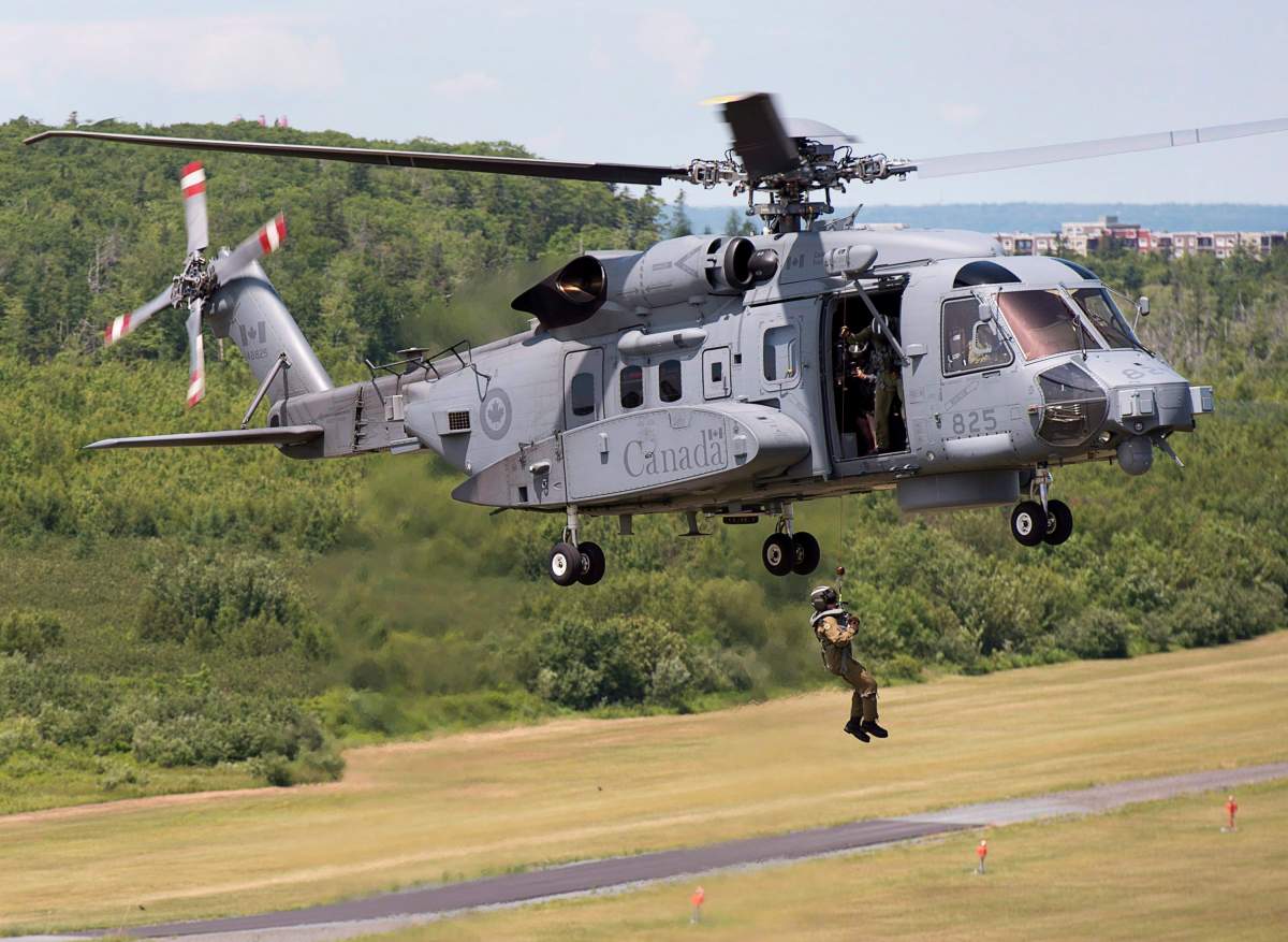 An RCAF CH-148 Cyclone maritime helicopter technician engages in a hoist exercise in Halifax on Friday, July 13, 2018.