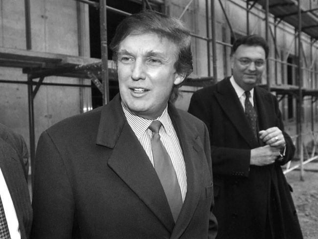 In this Nov. 5, 1996 file photo, Donald Trump, left, checks out sites in Moscow, Russia, for luxury residential towers.