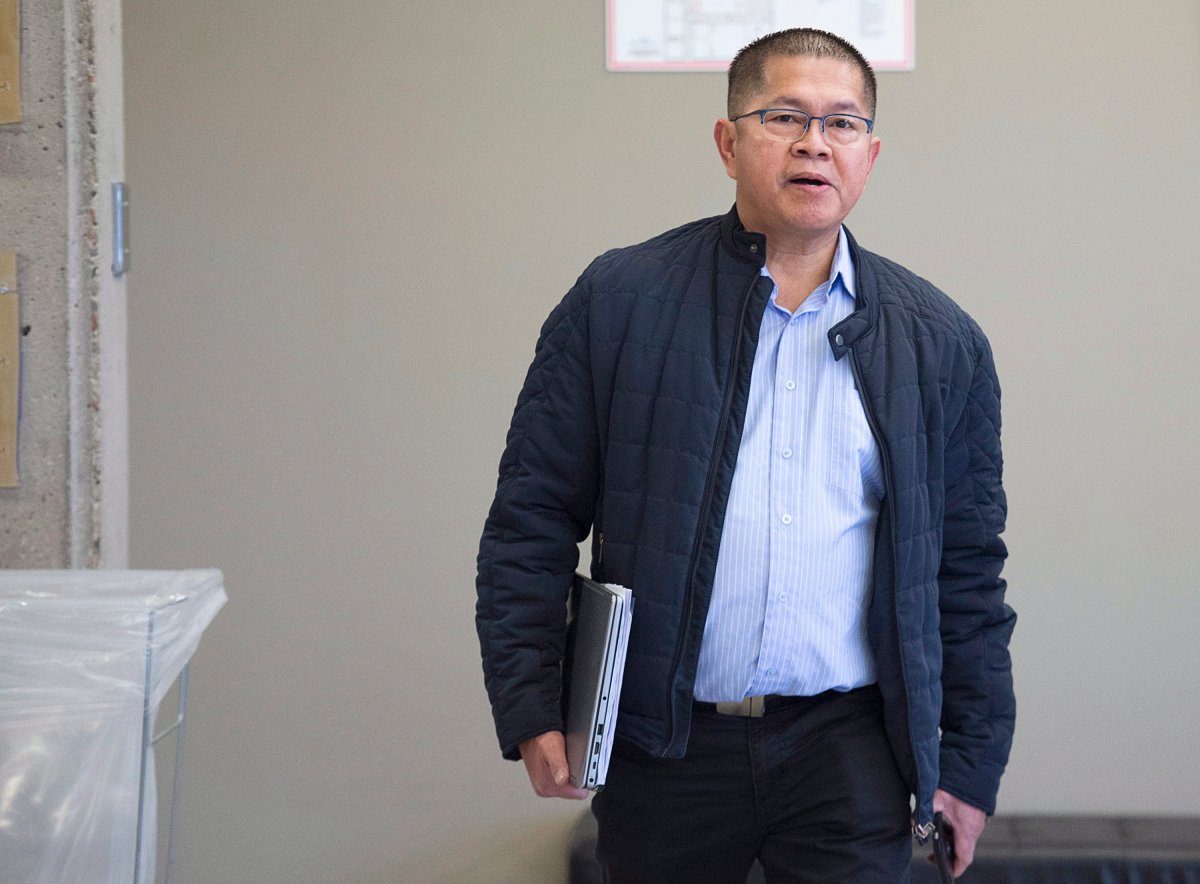 Hector Mantolino, charged with not paying Filipino temporary workers their required wages, arrives at Nova Scotia Supreme Court for his sentencing hearing in Halifax on Monday, Dec. 3, 2018. Mantolino, owner and operator of Mantolino Property Services Ltd., entered a guilty plea to charges under the Immigration and Refugee Protection Act following a Canada Border Services Agency investigation.