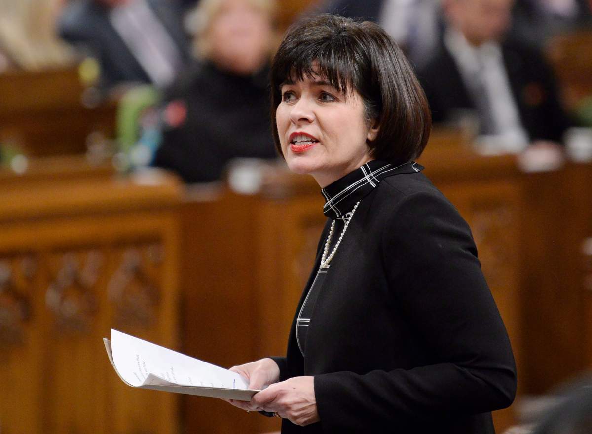 Health Minister Ginette Petitpas Taylor rises during question period in the House of Commons on Parliament Hill in Ottawa on Tuesday, Dec. 4, 2018.