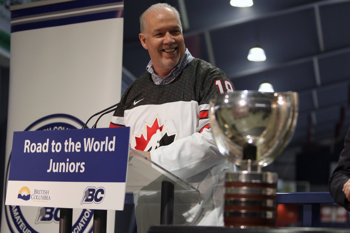 The World Juniors Championship Trophy was on display as Premier John Horgan speaks during a press conference before Team Canada hopefuls practice during selection camp at the Q Centre in Victoria, B.C., on Tuesday, December 11, 2018. THE CANADIAN PRESS/Chad Hipolito.