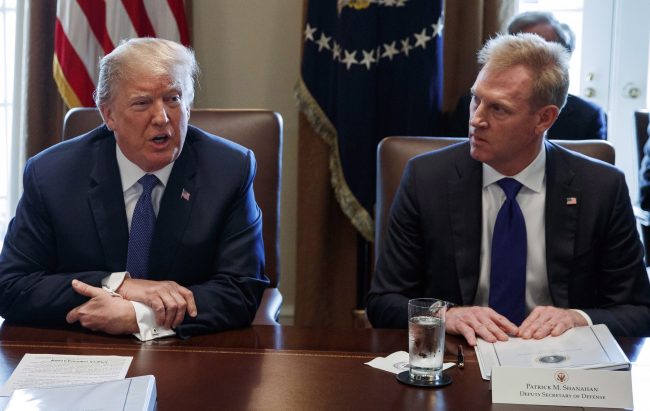 In this April 9, 2018, file photo, Deputy Secretary of Defense Patrick Shanahan listens as President Donald Trump speaks during a cabinet meeting at the White House.