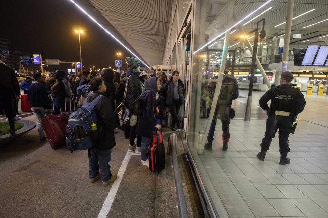 Military police in the departure hall 3 at Amsterdam Schiphol Airport, Dec. 31, 2018.