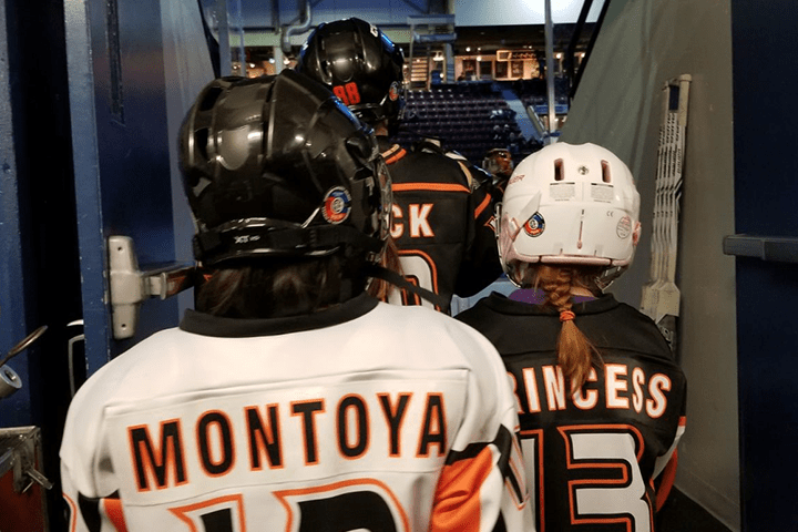 Seven-year-old Martin Montoya preparing for a hockey game.
