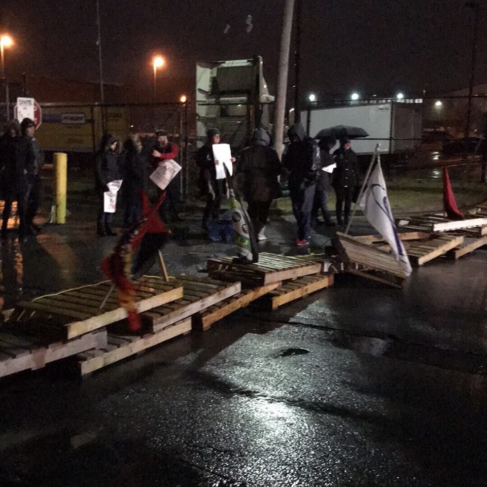 Six people were arrested outside the Canada Post plant in Halifax Sunday night during a protest.