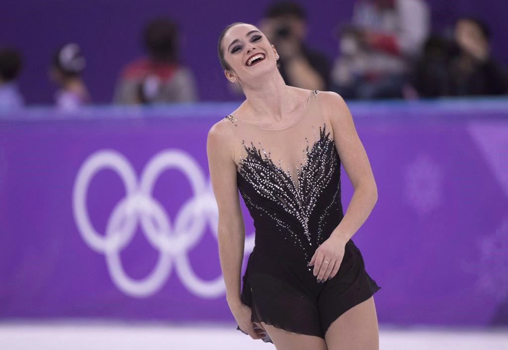 Canada's Kaetlyn Osmond reacts at the end of her performance in the women's figure skating free program at the Pyeongchang Winter Olympics Friday, February 23, 2018 in Gangneung, South Korea.