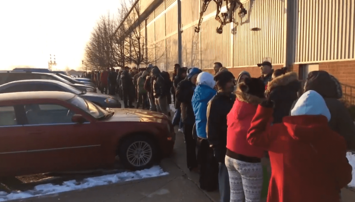 Hundreds of families lined up at the Western Fair Agriplex to receive a Christmas hamper. 
