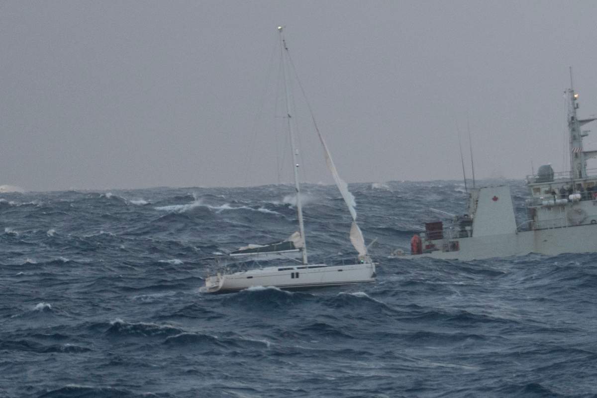 A photo of the damaged sailboat that four crew members were rescued from on Dec. 17, 2018.