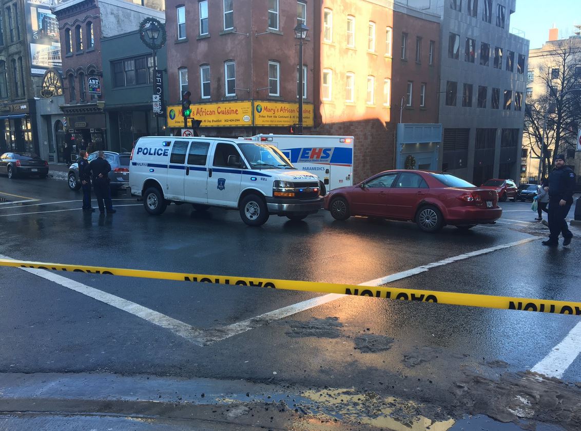 Halifax Regional Police attend the scene of a crash at the corner of Barrington and Prince streets on Saturday, Dec. 29, 2018. 
