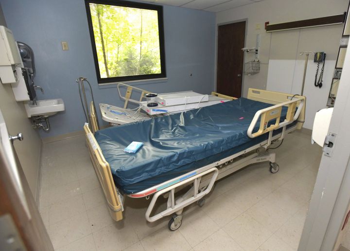 A file photo of a hospital bed is shown.