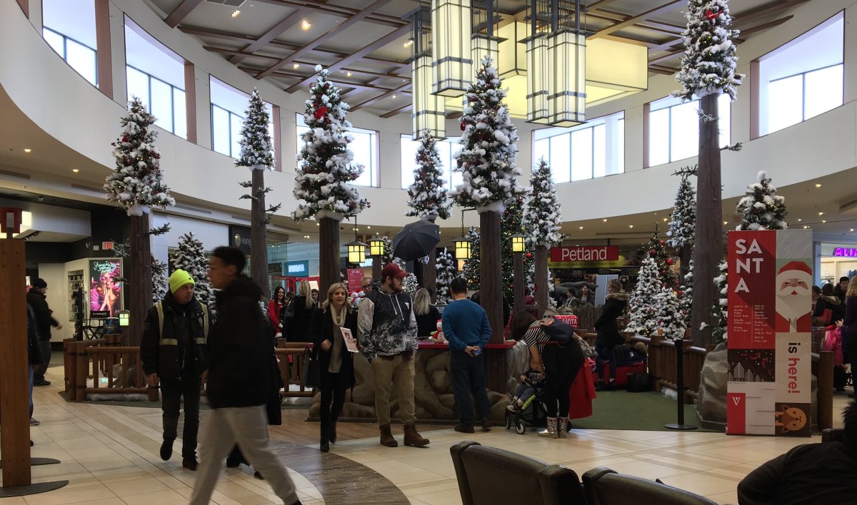 Crowds of Winnipeggers are last-minute shopping at St. Vital Centre on the final weekend before Christmas.