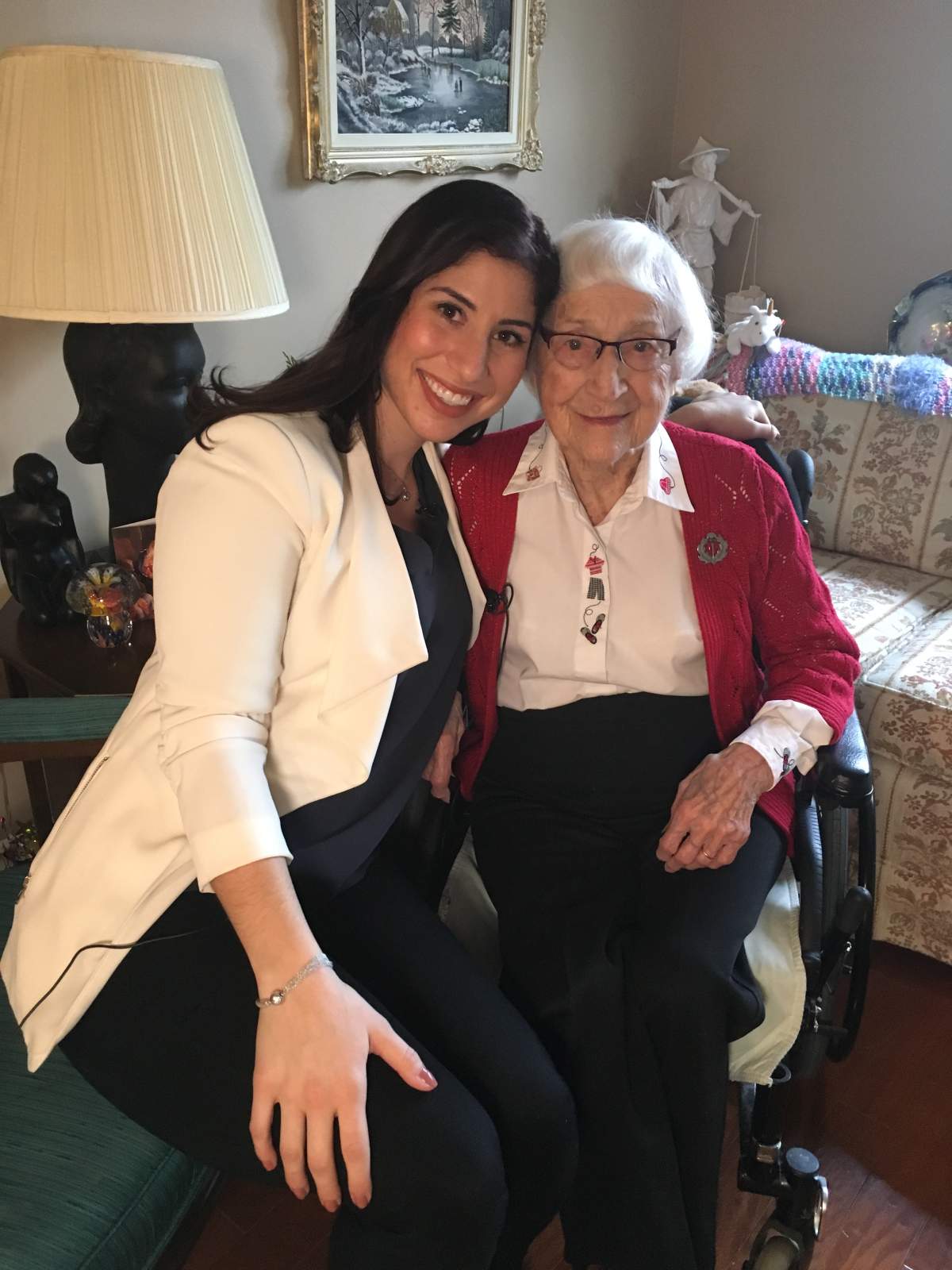 Marguerite Cook, right, sits with Global News’ Niki Anastasakis, left.