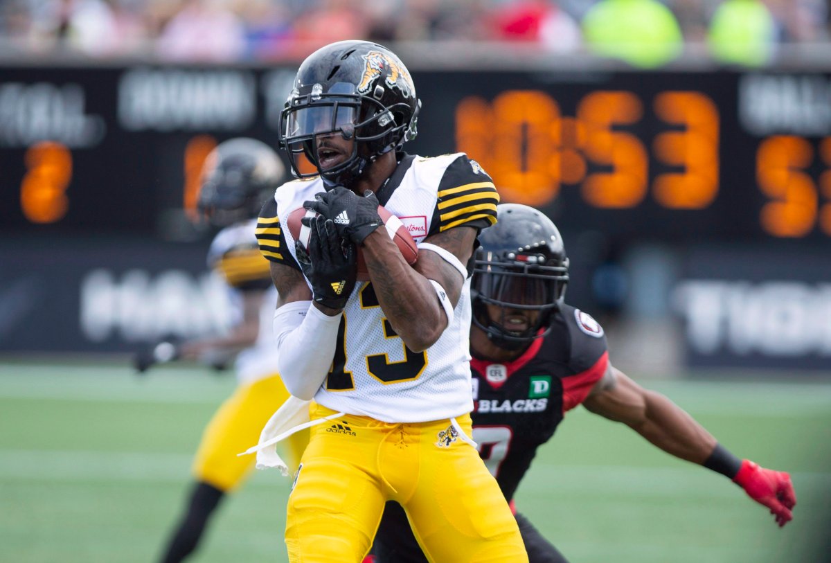 Hamilton Tiger-Cats wide receiver Jalen Saunders (13) makes a catch during first-half CFL football game action against the Ottawa Redblacks in Hamilton, Ont., on Saturday, July 28.