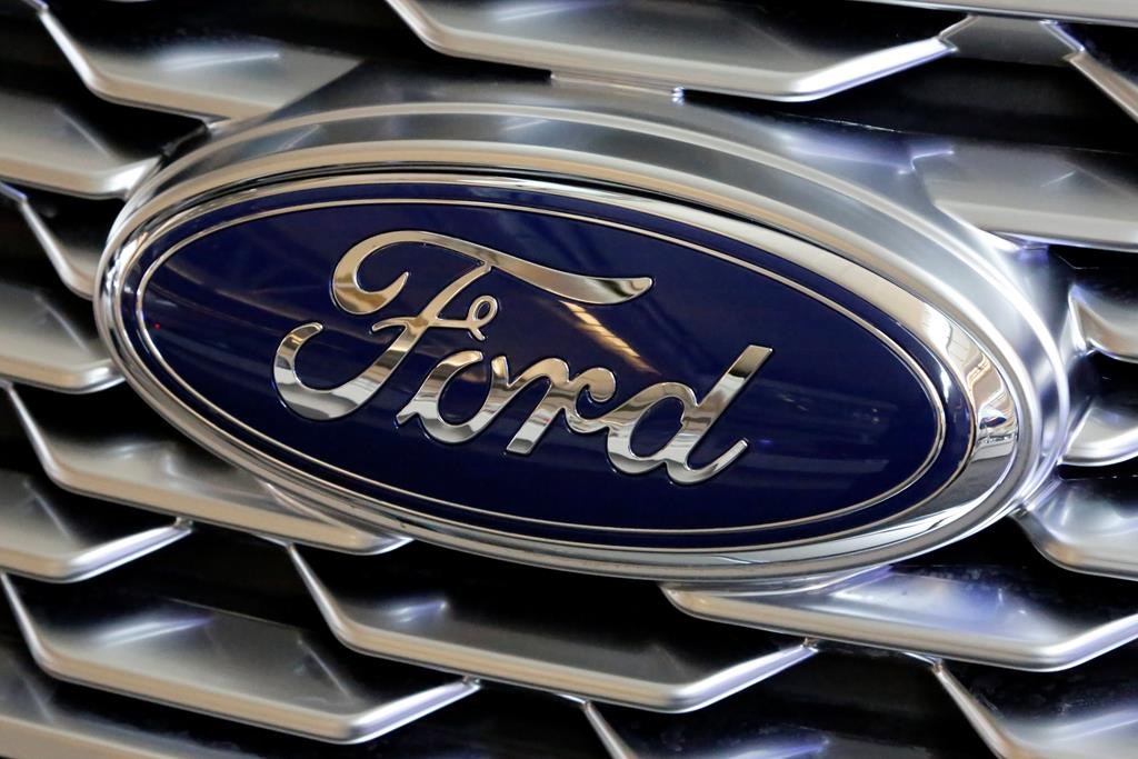 This Feb. 15, 2018 photo shows a Ford logo on a Ford F-Series truck.