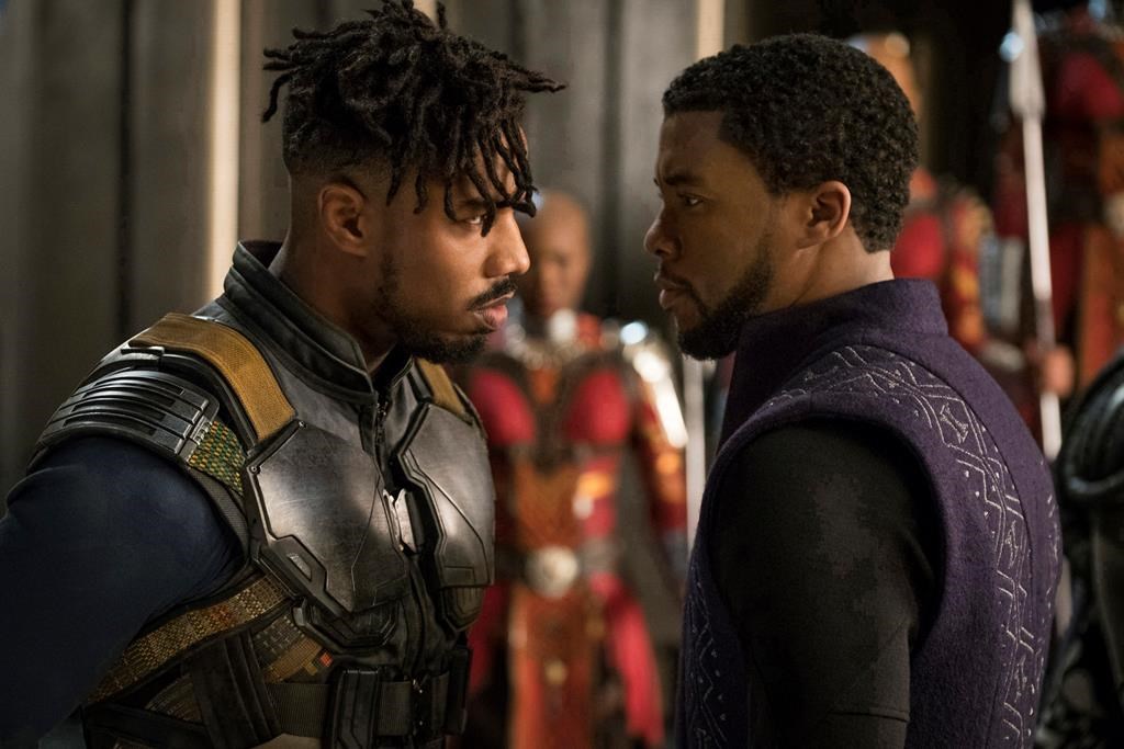 This image released by Disney shows Michael B. Jordan, left, and Chadwick Boseman in a scene from Marvel Studios’ “Black Panther.” (Matt Kennedy/Marvel Studios-Disney via AP)