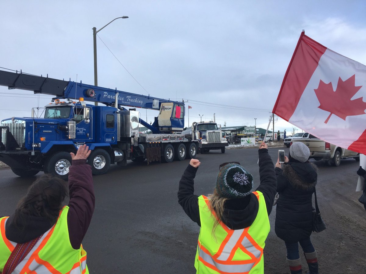 A large line of trucks in a pro-pipeline convoy through the Nisku industrial park, south of Edmonton, to show their support for Alberta's beleaguered energy industry on Wednesday, December 19, 2018.