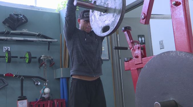Paul Taylor, the Owner of the Brickhouse gym doing weight reps on Saturday morning.