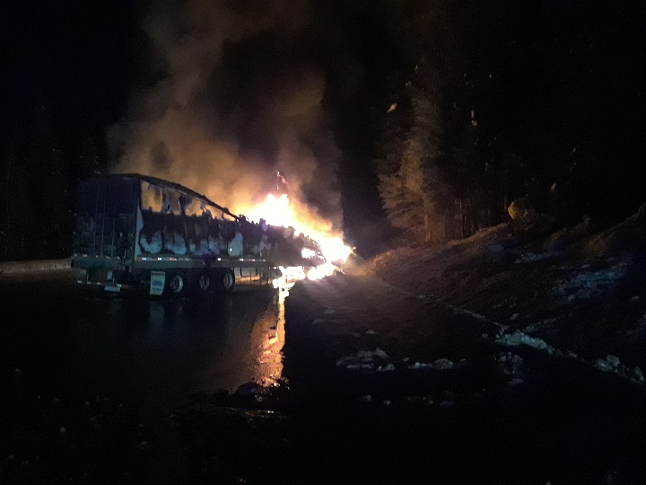 A semi carrying parcels caught fire and blocked both lanes of the Trans-Canada Highway near Revelstoke, B.C., on Tuesday evening.
