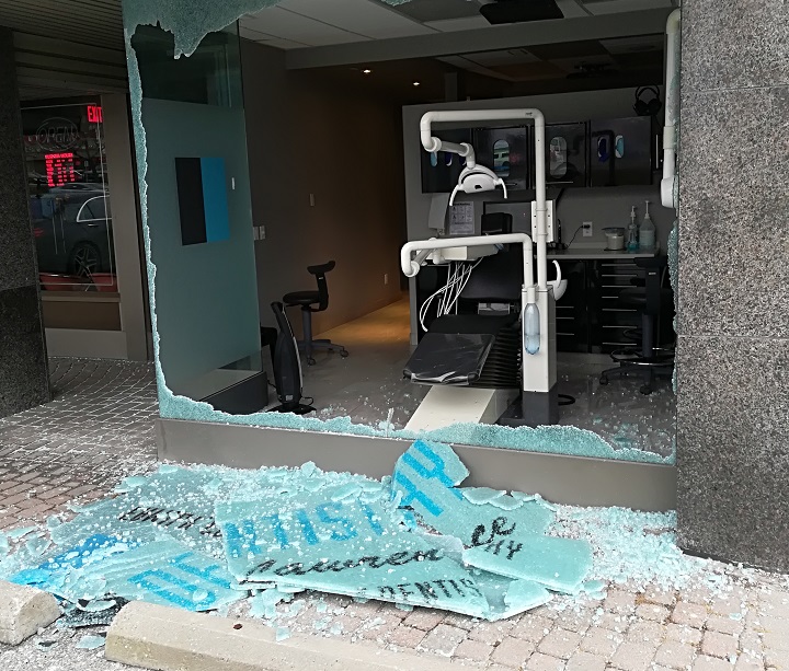 The window of a dentist office was shattered in the shooting.