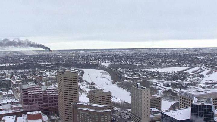 Thick plumes of smoke from a refinery are seen from downtown Edmonton on Dec. 28, 2018.